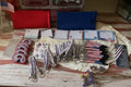 Assorted patriotic stationery items including pens, notepads, tattoos, lanyard, bracelet and bookmark!